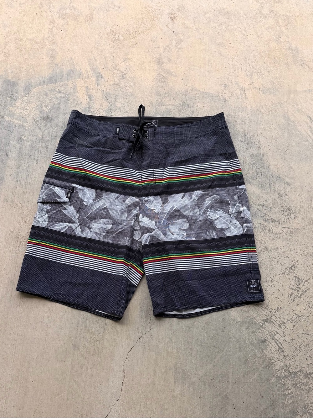 Vans Black Board Shorts with Gray Floral Panels and Red/Green/Yellow Stripes